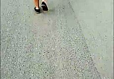 following mature latina in skirt and thong on public street