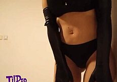 Tildzo, the Serbian softcore star, heats up with a curvy display.