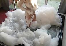 What happens when a cross-dressed guy joins a busty Latina bathing?